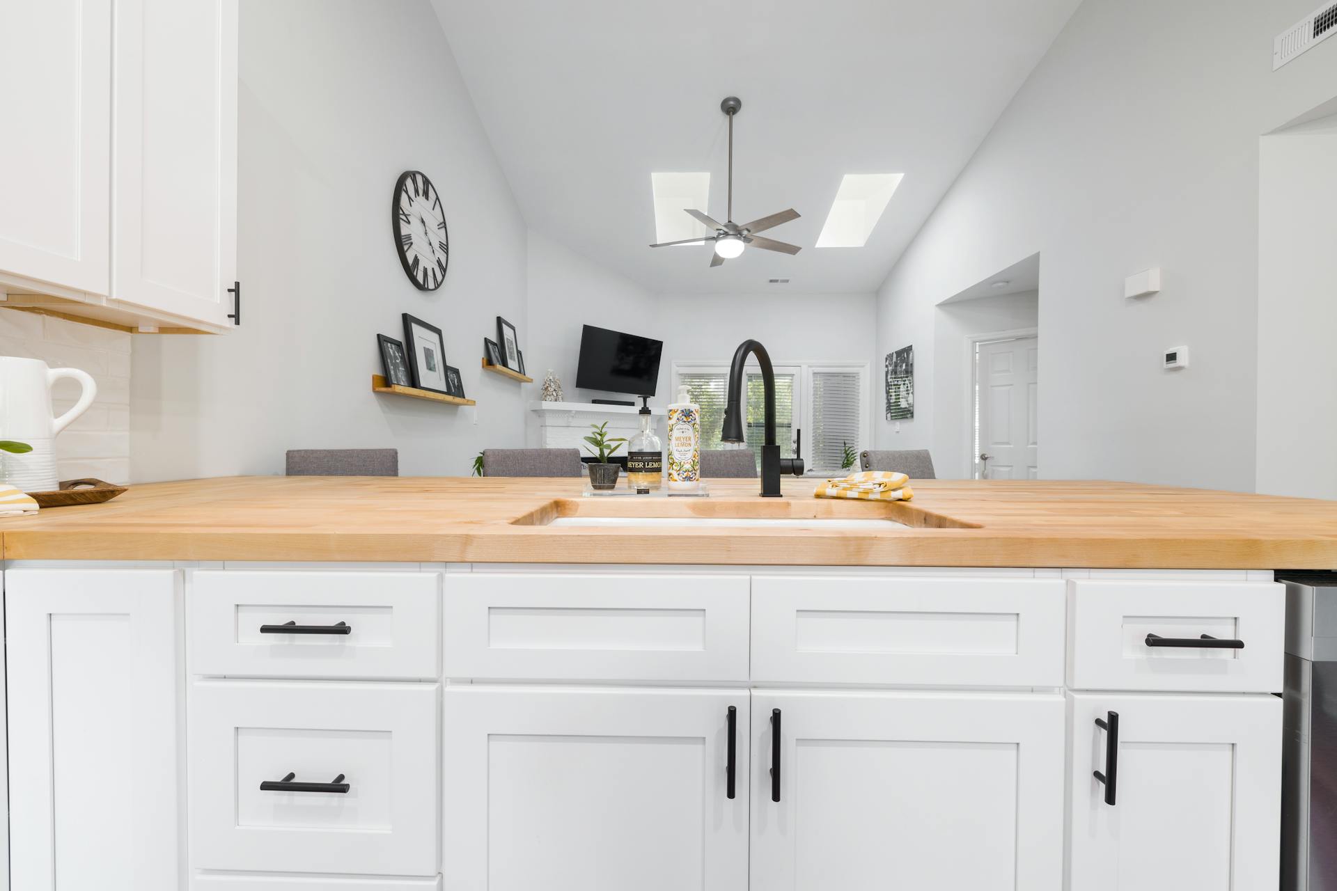 White Wooden Cabinets in Kitchen